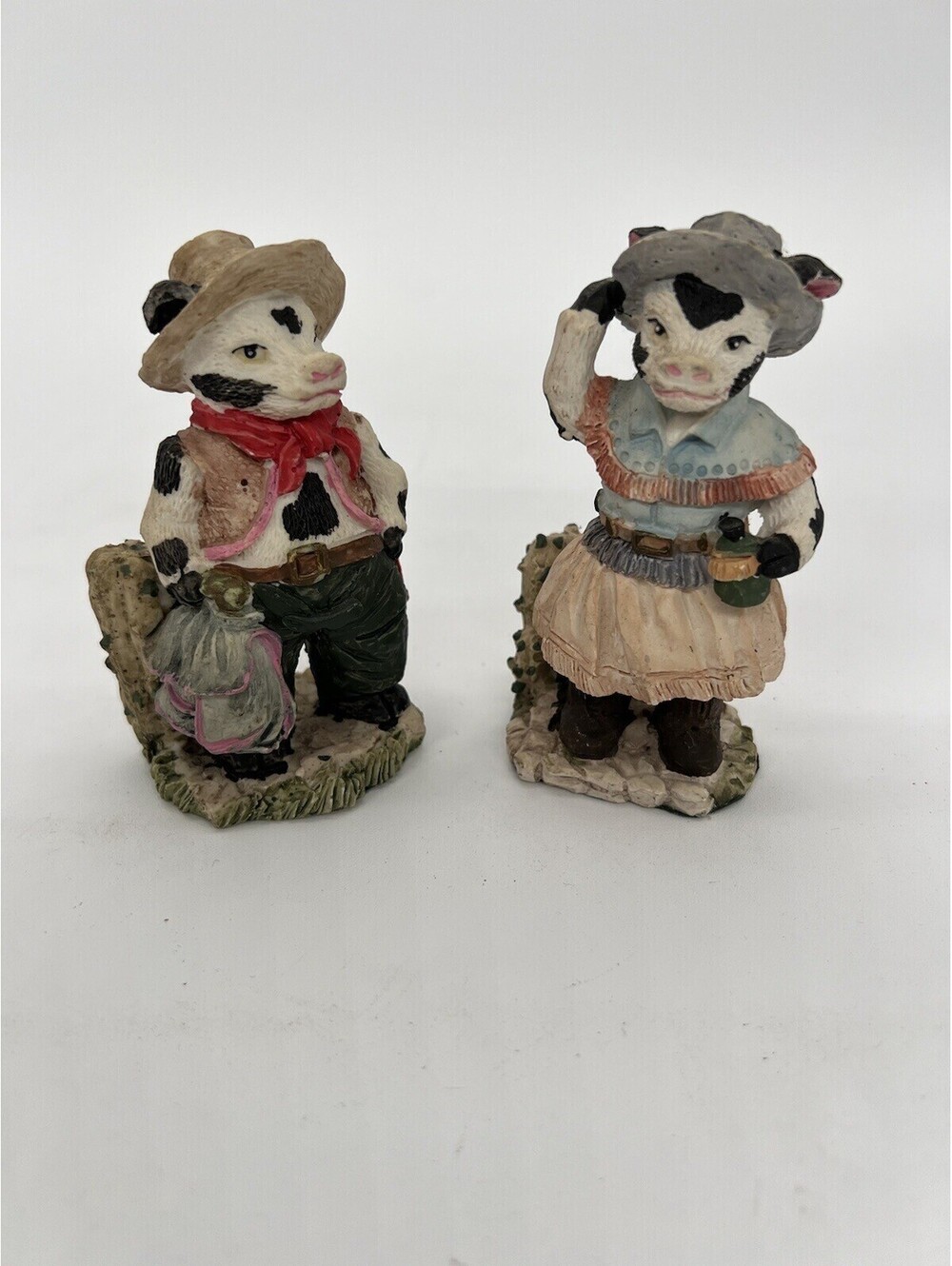Vintage Cow Couple Dressed in Western Attire
